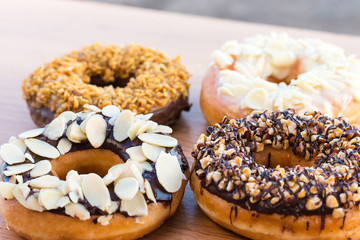 Donuts on wooden background