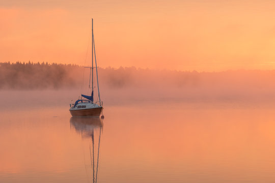 Sailboat in Morning light and Mist