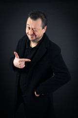 Handsome man doing different expressions in different sets of clothes: blink