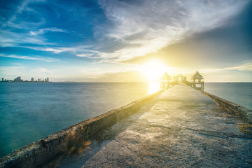 Beautiful sunset sky over jittapawan baddish Temple on the sea, Thailand landmark