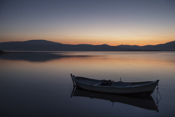 Fototapeta na wymiar Beautiful sunset with fishing boat