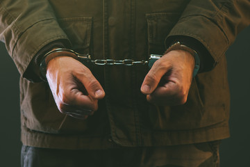 Handcuffed soldier