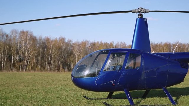 small passenger helicopter on the airfield