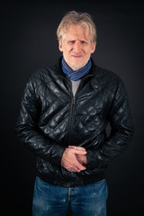 Fototapeta premium Handsome man doing different expressions in different sets of clothes: stomachache