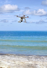 drone hovering over the sea