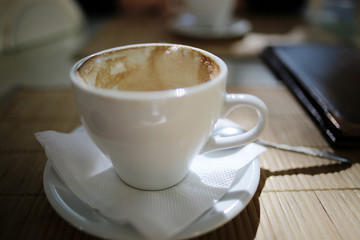 cup of tea or coffee in a cafe serving breakfast table