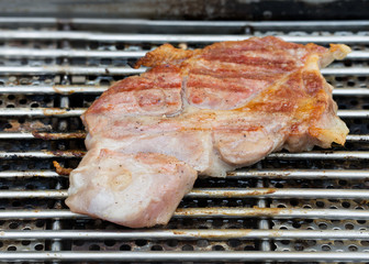 Grill pork with black pepper on Barbecue grills / Select focus