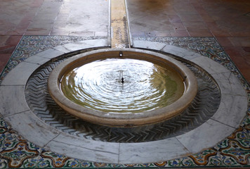 Ancient system of air conditioner: fountain of Royal Alcazars of Seville, Spain.