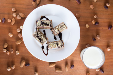 Chocolate cake with walnut cut into squares