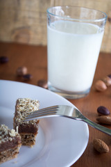 Chocolate cake with walnut cut into squares