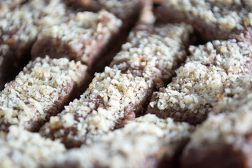 Chocolate cake with walnut cut into squares
