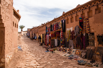 Fortified village Ait Benhaddou with shops on street