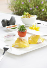 Eggs omlette served with tomato