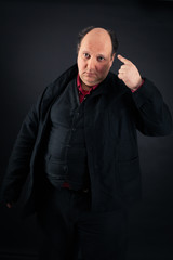 Fototapeta premium Handsome man doing different expressions in different sets of clothes: you are crazy
