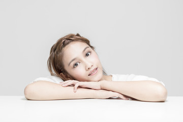 Obraz premium portrait of beautiful girl wearing white dress, half latina and half asian