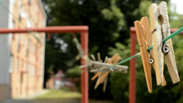 Clothes pegs on a clothesline