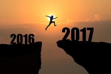 man jumping from 2016 to 2017