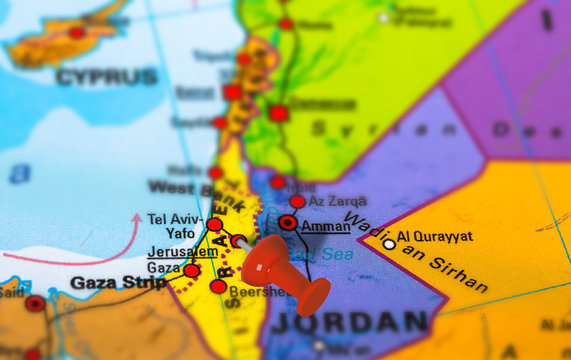 Jerusalem in Israel pinned on colorful political map of Middle East. Geopolitical school atlas. Tilt shift effect.