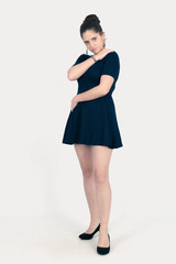 Beautiful woman doing different expressions in different sets of clothes: love