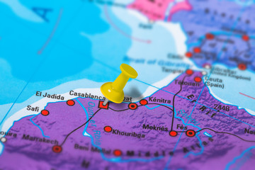 Casablanca in Morocco pinned on colorful political map of Africa. Geopolitical school atlas. Tilt shift effect.