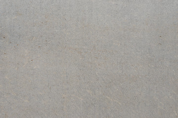 Wall fragment with scratches and cracks
