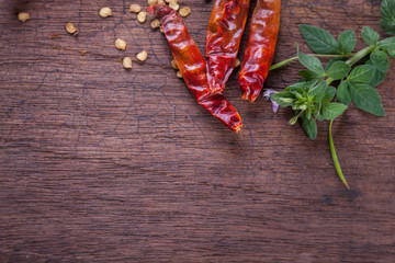 red hot chili pepper on wood background