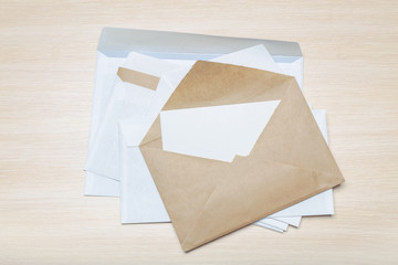 Photo of blank envelope on a  wooden background