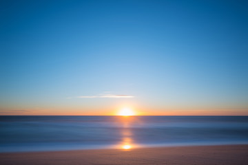 Fototapeta na wymiar Abstract motion blur of a seascape sunrise 