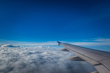 Fototapeta na wymiar Flying above the clouds 
