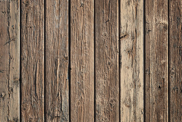 Texture of weathered brown wooden fence