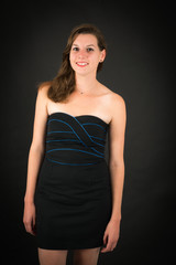 Fototapeta premium Beautiful woman doing different expressions in different sets of clothes: smile