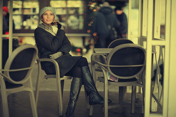urban portrait of woman in winter clothes