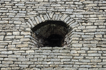 Embrasure in old stone wall