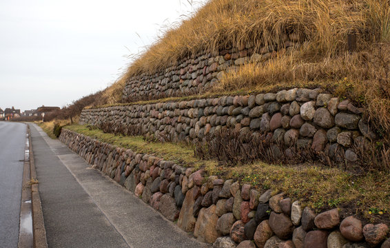 Frisian stone wall planted with European beach grass
