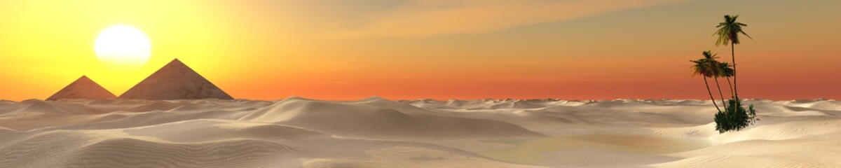 Fototapeta na wymiar The pyramids in the desert. An oasis in the desert. Panorama of the desert. 