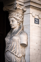 Stone entrance decoration with Number 21, Paris, France