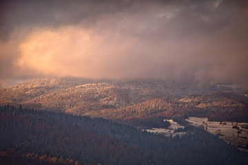 Śnieżny zimowy dzień w górskim mieście Muszyna. Snowy day in the mountain in Muszyna - Poland. © rogozinski