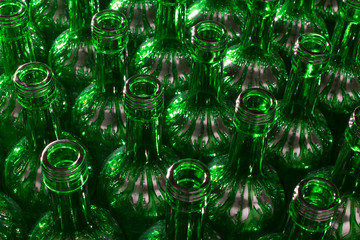 stack of Empty green glass Bottles