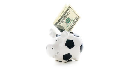 one hundred US dollars in Piggybank isolated on white background