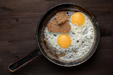 fried egg on an old pan