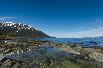 Fototapeta na wymiar Coast of the Norwegian Sea.Tromso,Oldervik.