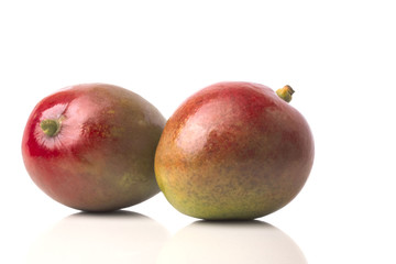 two very ripe juicy tropical mango