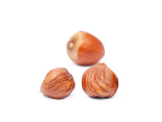 Group fresh hazelnuts isolated on white background