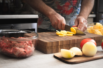 Cooking baked meat with potatoes horizontal