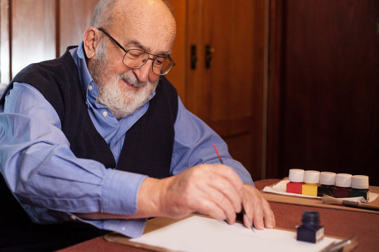 Old Man Writing A Letter