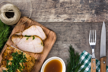 Roasted pork on wooden table
