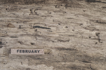 cube calendar for february on wooden background