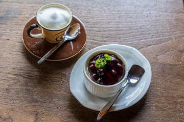 hot cappuchino  with strawberry Cheesecake
