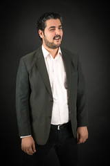 Handsome man doing different expressions in different sets of clothes: wink