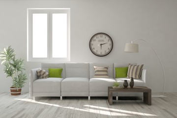 White living room interior with sofa